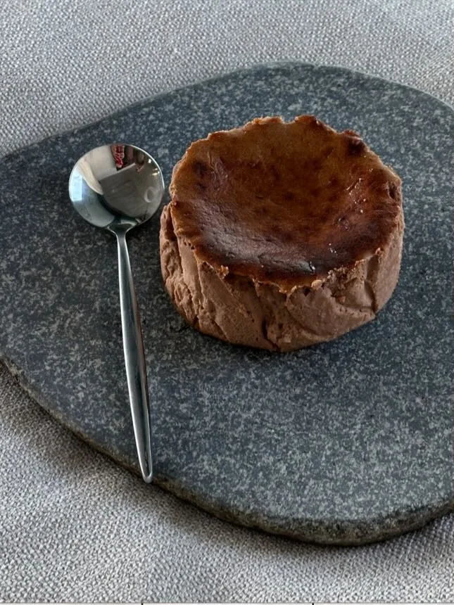 Nutella tartza, whole, on the basalt slab with a spoon